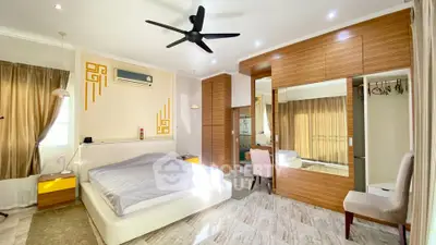 Spacious bedroom with modern decor and large mirrored wardrobe