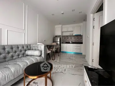 Modern apartment interior with stylish living room and compact kitchen