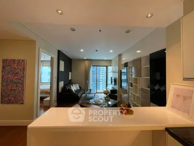 Modern open-layout living room with city view and elegant decor