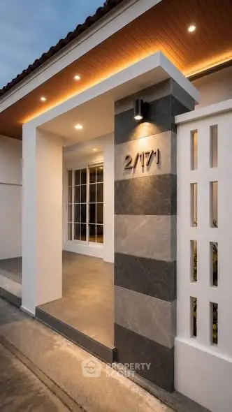 Modern house entrance with stylish lighting and sleek architectural design