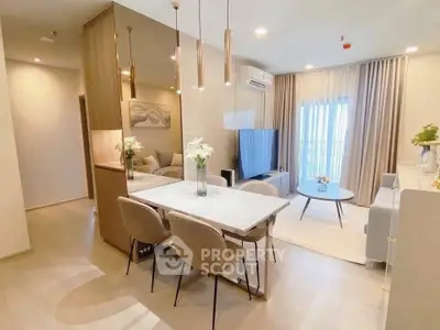 Modern living room with elegant dining area and stylish decor