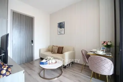 Modern living room with cozy sofa and dining area in stylish apartment