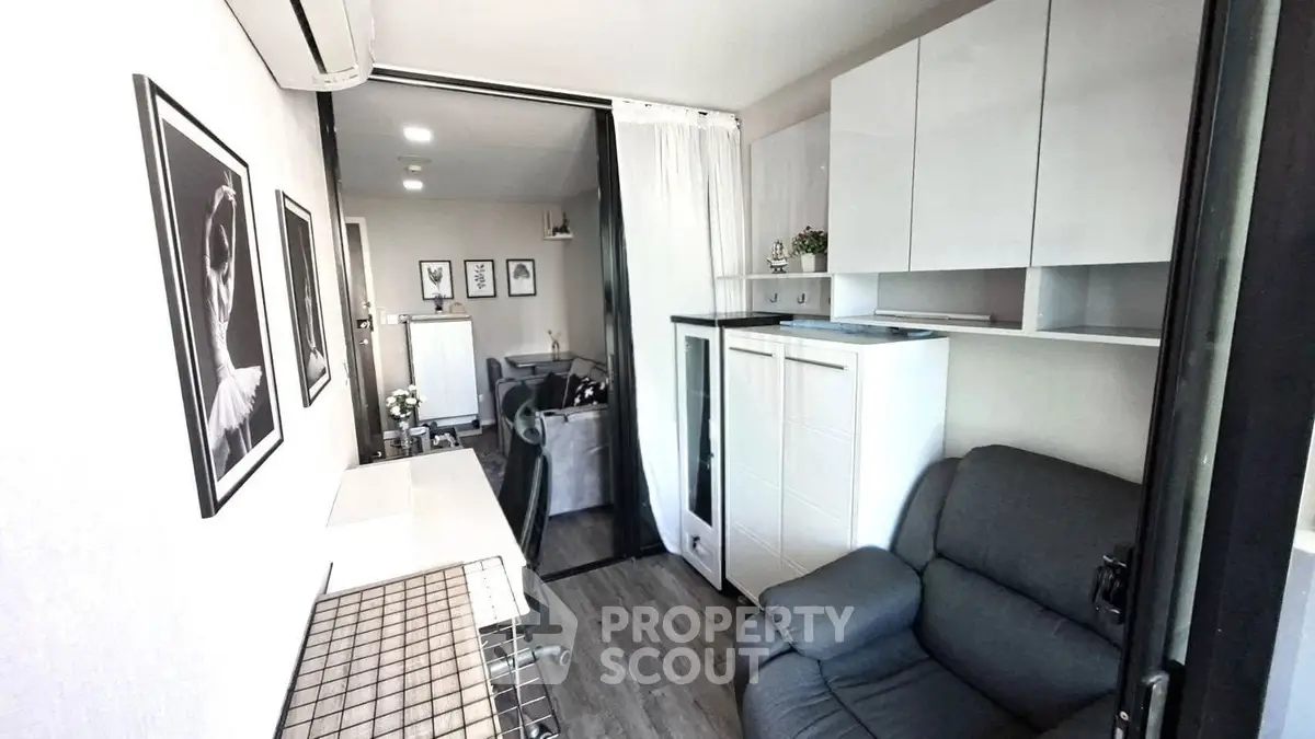 Modern compact living space with stylish decor and efficient storage solutions.