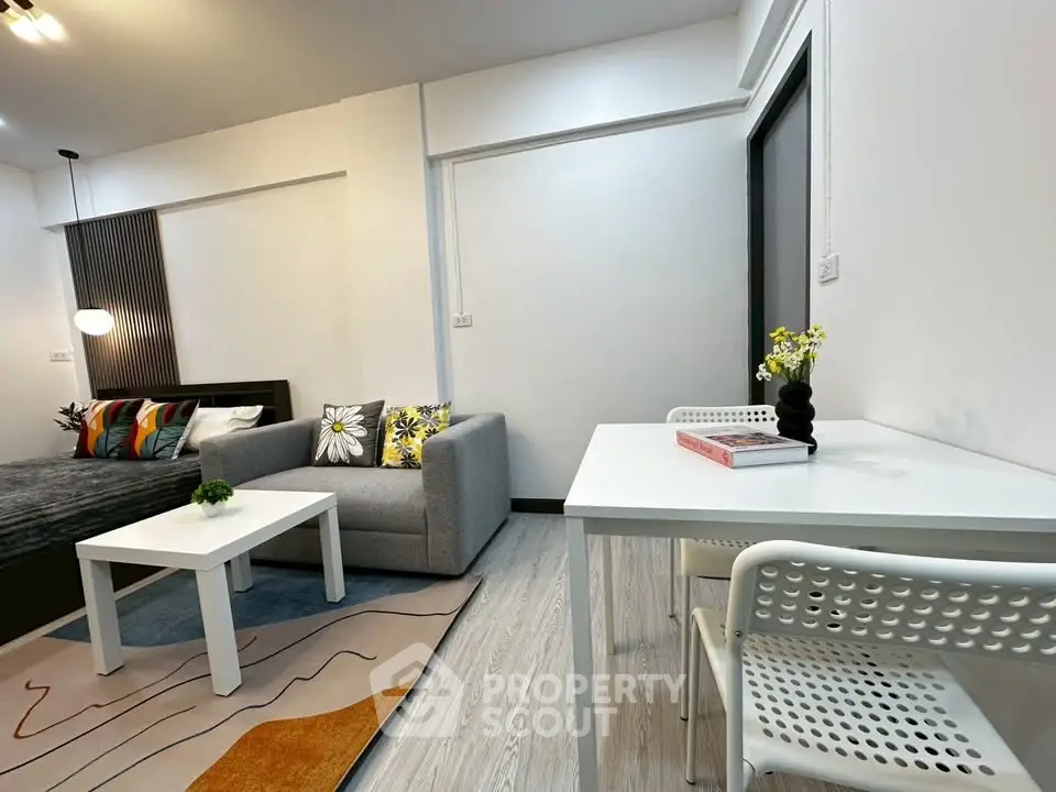 Modern living room with stylish decor and cozy seating area