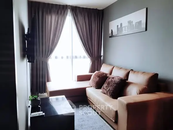 Stylish living room with modern decor and cozy seating area.