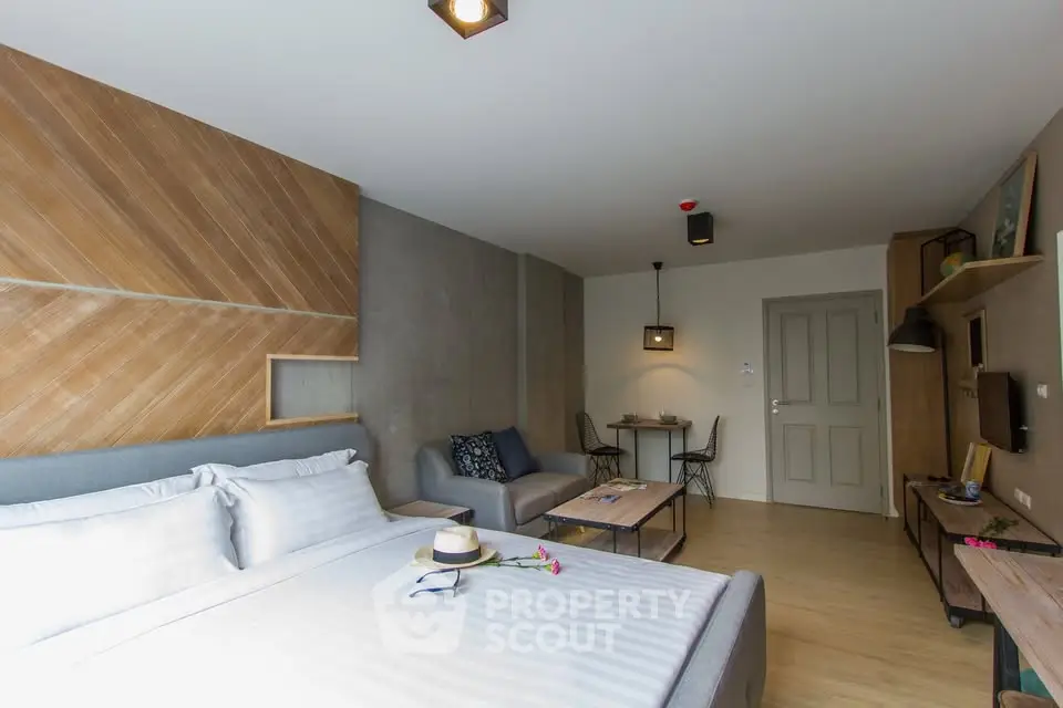Modern studio apartment with stylish decor and cozy living area