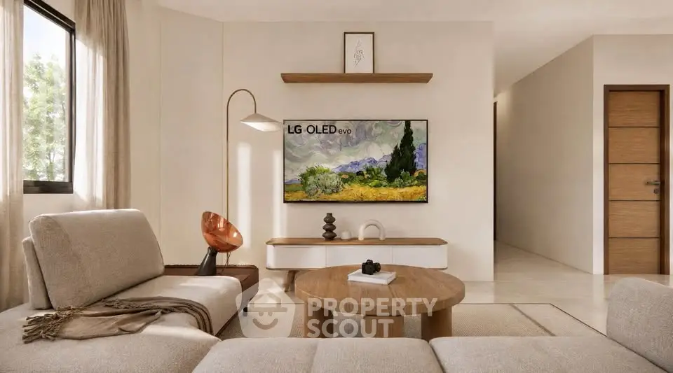 Modern living room with stylish furniture and wall-mounted TV, showcasing elegant interior design.