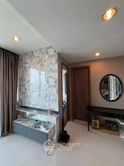 Modern interior with marble accents and stylish decor in a contemporary living space.