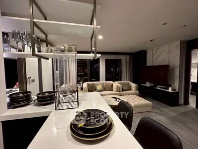 Luxurious modern living room with elegant decor and open kitchen layout