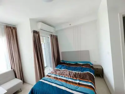 Modern bedroom with air conditioning and stylish decor in a bright apartment.