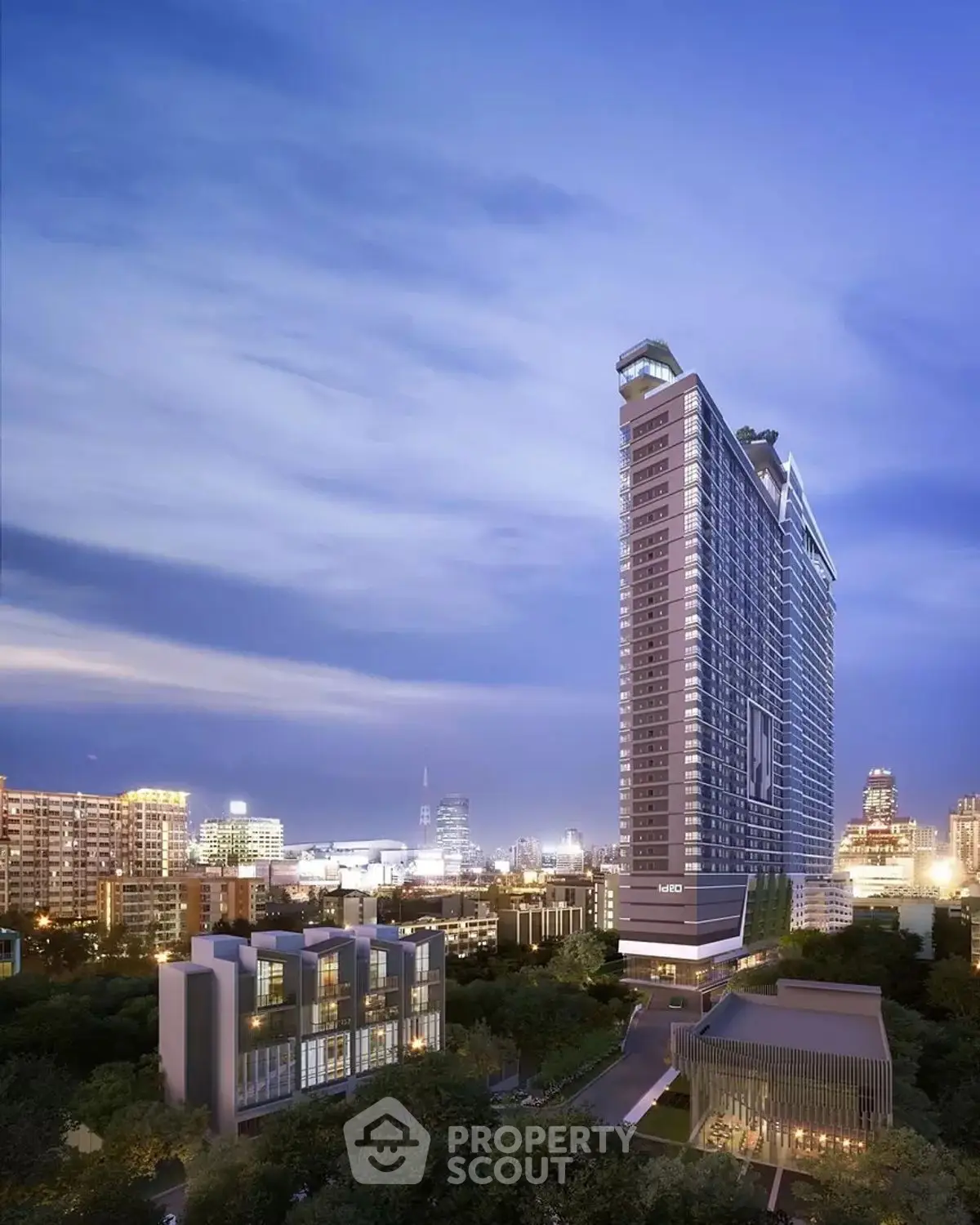 Stunning high-rise building with cityscape view at dusk, perfect for urban living.