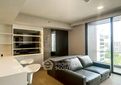 Modern living room with sleek design and city view balcony