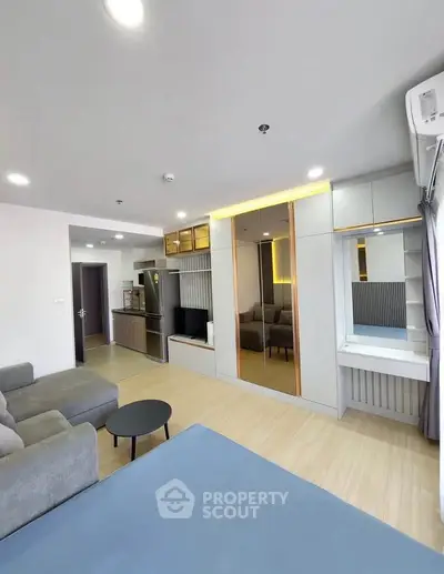 Modern living room with stylish furniture and open layout in a contemporary apartment.