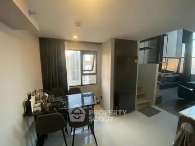 Modern dining area with city view in a stylish apartment