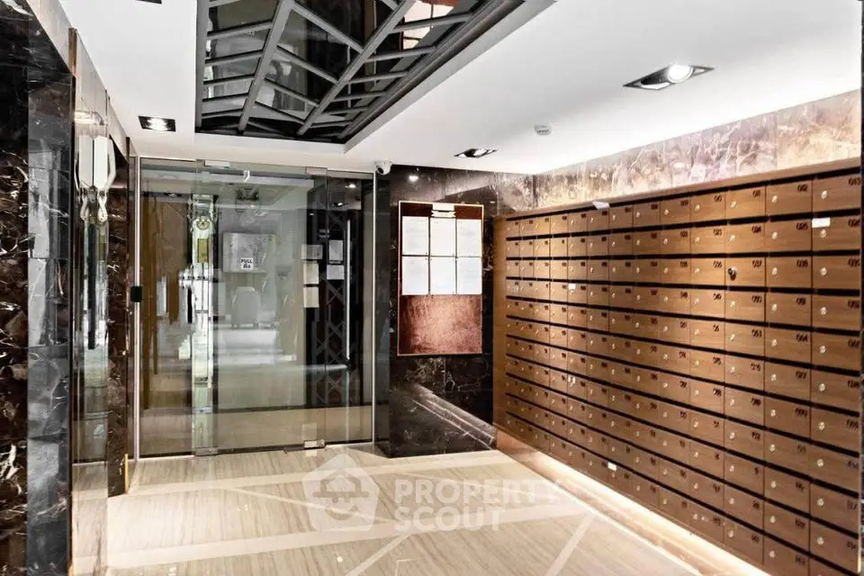 Luxurious building entrance with elegant mailboxes and modern design