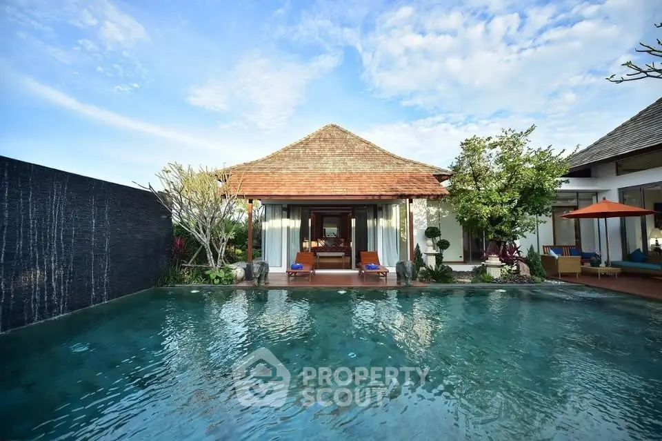Luxurious villa with stunning pool and tropical garden view