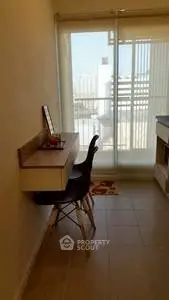 Bright study nook with desk and chair in modern apartment