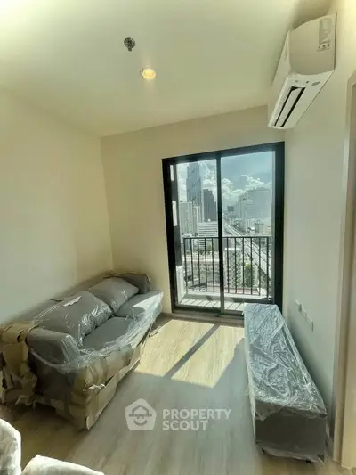 Bright living room with city view and modern air conditioning