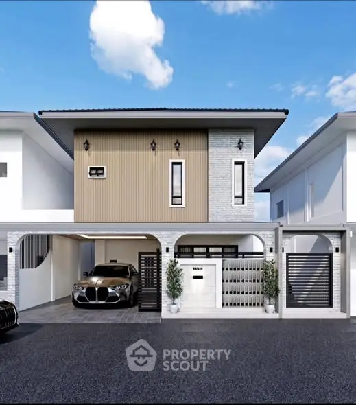 Modern two-story house with sleek design and spacious driveway