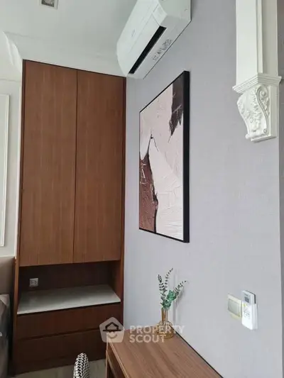 Modern bedroom corner with air conditioning and stylish decor