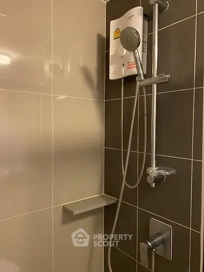 Modern bathroom shower with sleek design and water heater