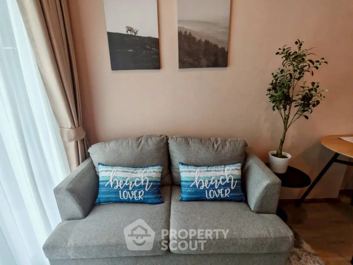 Cozy living room with stylish decor and comfortable sofa, perfect for relaxation.