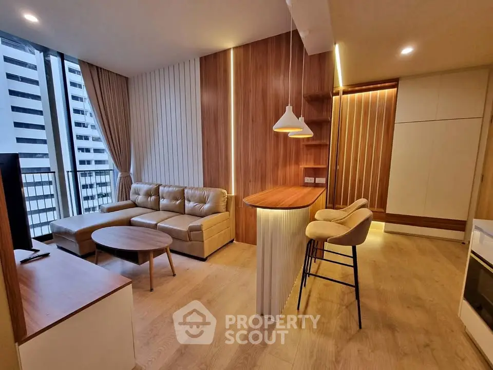 Modern living room with stylish decor and open layout in high-rise apartment