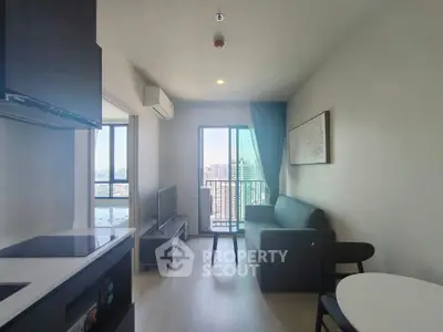 Modern living room with city view and sleek furnishings