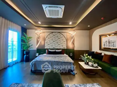 Luxurious bedroom with elegant decor, plush bedding, and stylish lighting, perfect for relaxation and comfort.