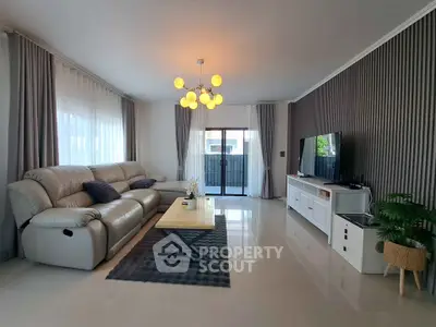 Spacious modern living room with elegant decor and large windows