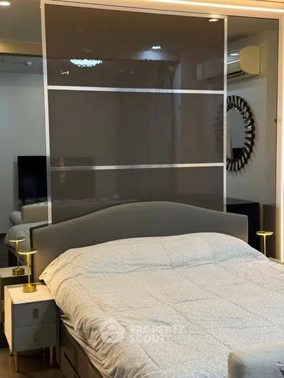 Modern bedroom with stylish decor and comfortable bedding