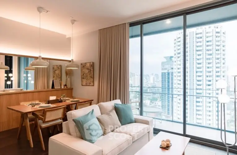 Luxurious living room with modern decor and stunning city view from large windows.