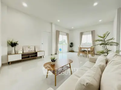 Spacious modern living room with elegant decor and natural light