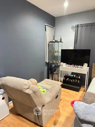 Cozy living room with modern decor and entertainment setup