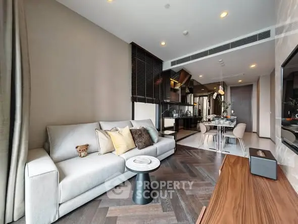 Modern living room with stylish decor and open kitchen layout