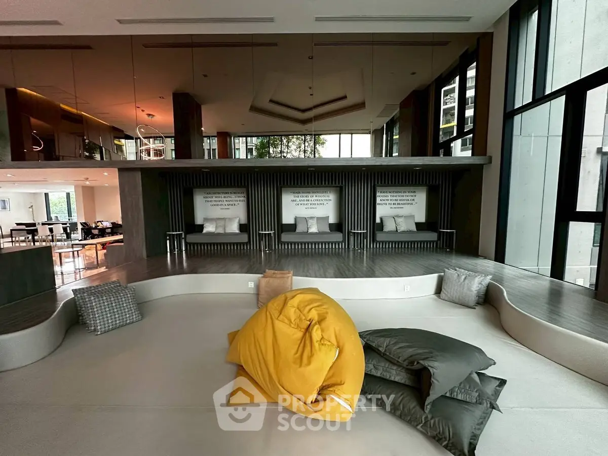 Luxurious modern living space with cozy seating and large windows