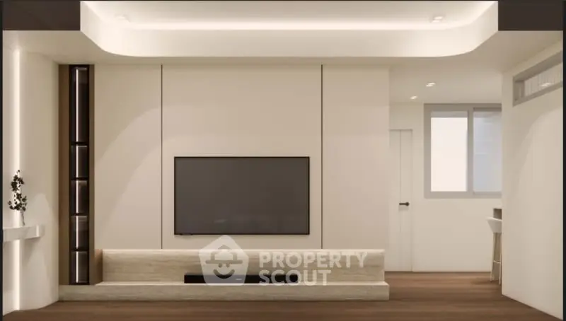 Modern living room with sleek TV setup and elegant lighting
