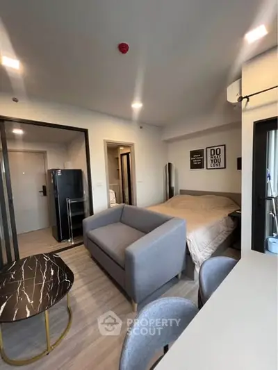 Modern studio apartment with stylish decor and open layout