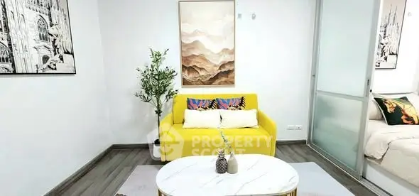 Modern living room with vibrant yellow sofa and stylish decor