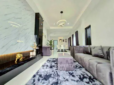 Luxurious modern living room with elegant decor and plush furnishings