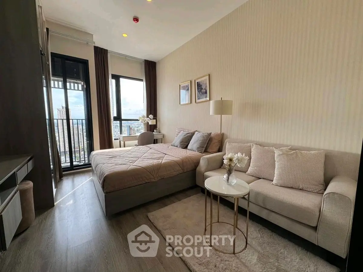 Modern bedroom with cozy sofa and city view balcony in luxury apartment