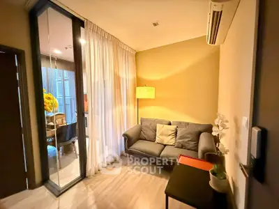 Cozy living room with modern sofa and balcony view