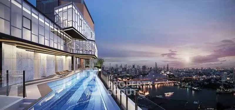 Luxurious rooftop pool with stunning city skyline view at sunset.
