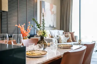 Elegant dining area with modern decor and natural light