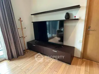 Modern living room with sleek TV stand and minimalist decor