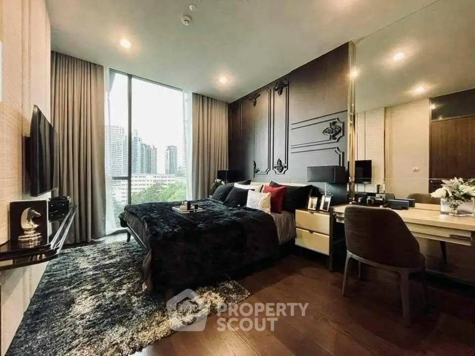 Luxurious modern bedroom with city view, elegant decor, and cozy ambiance.