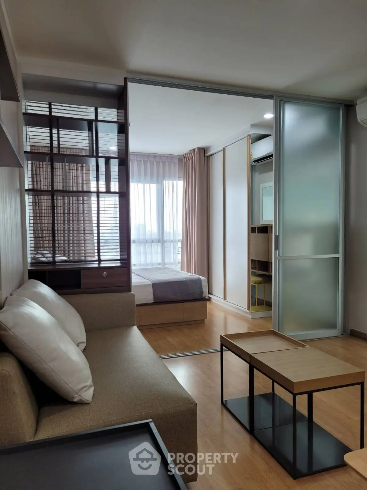 Modern studio apartment with open layout and stylish furnishings