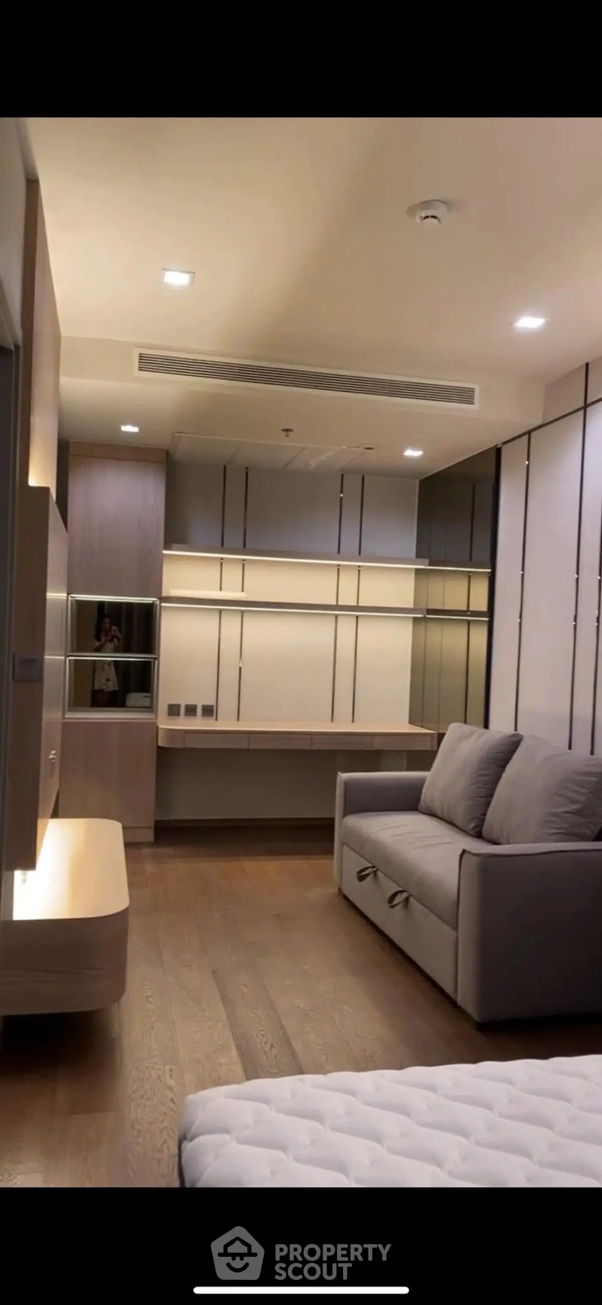 Modern living room with sleek furniture and ambient lighting