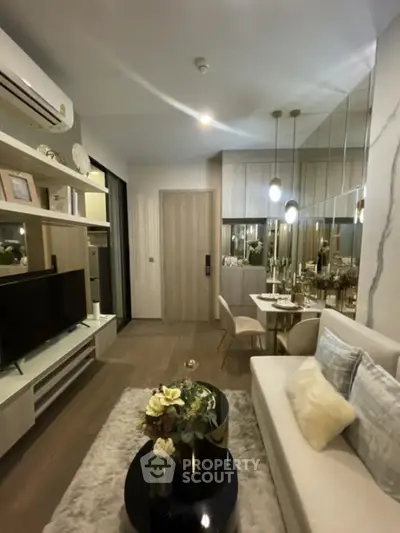 Modern living room with elegant decor and cozy dining area