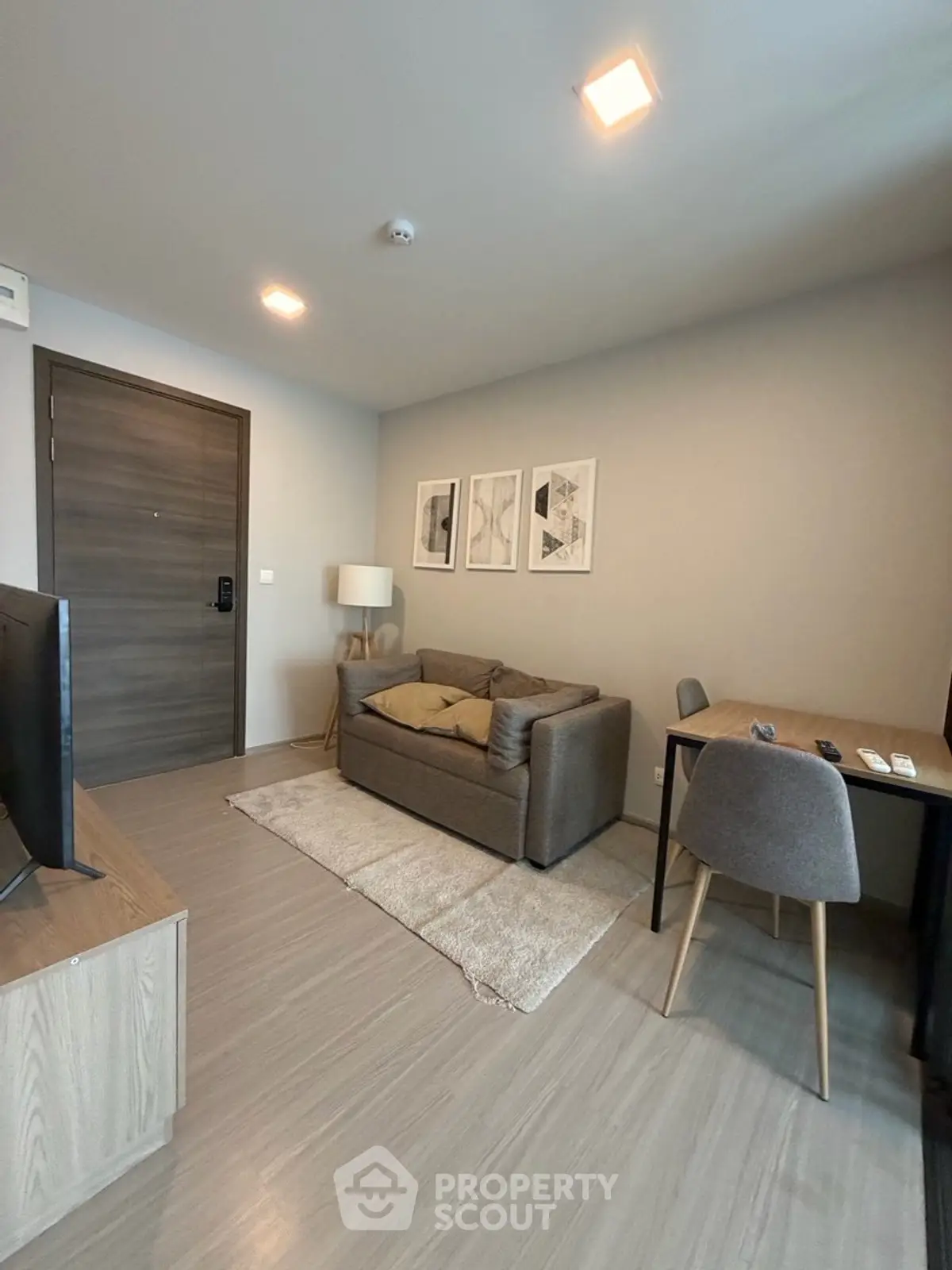 Modern living room with cozy sofa and stylish decor